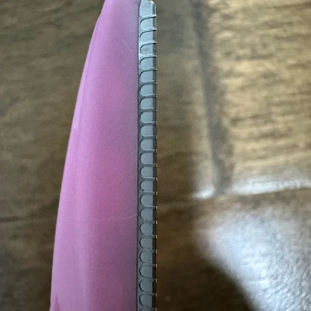 Peachly dermaplane razor photographed by a verified buyer