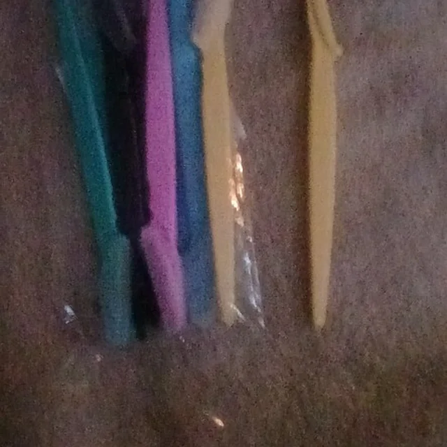 Peachly dermaplane razor photographed by a verified buyer